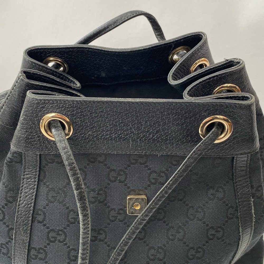Gucci Black GG Canvas Drawstring Backpack with Gold Accent - Picture 11 of 14